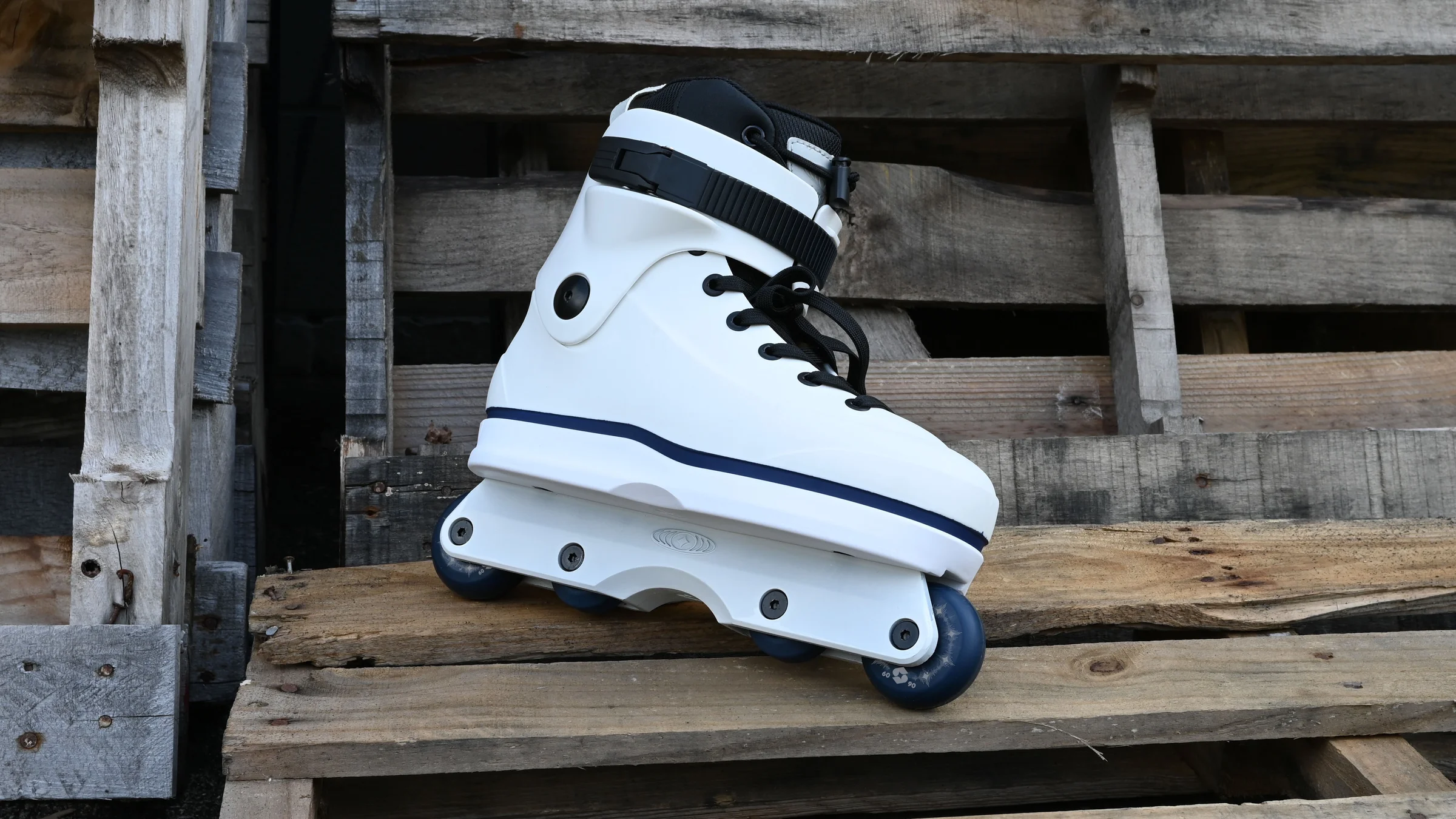 White Omni V3 skate on weathered timber